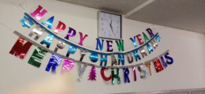 Many holidays to celebrate this season in shimmery signs